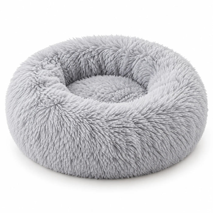 Panier rond en peluche gris clair pour chat, rebord garni sur tout le tour et centre plat